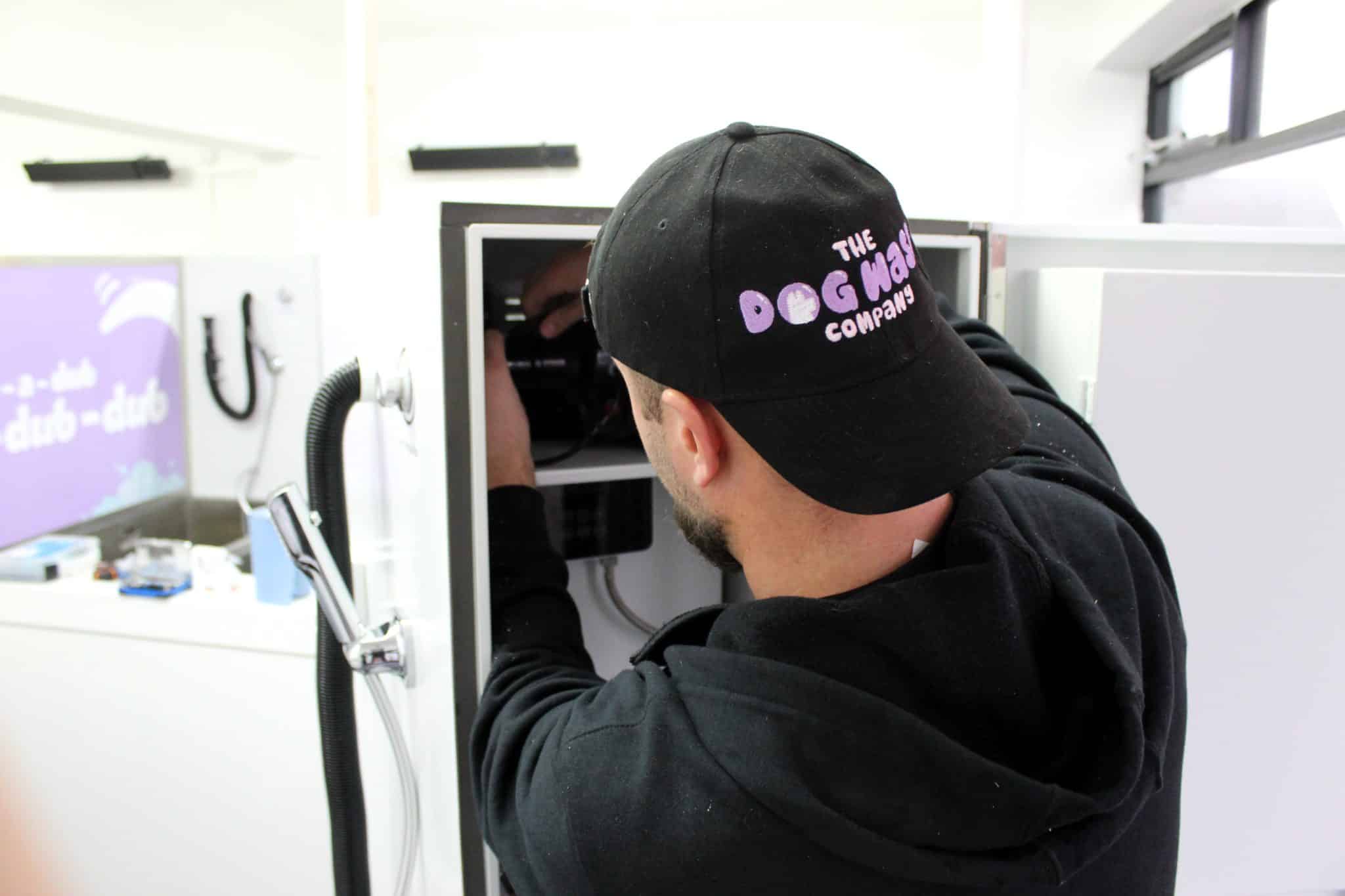 Self-service dog wash machine installed at a dog-friendly business
